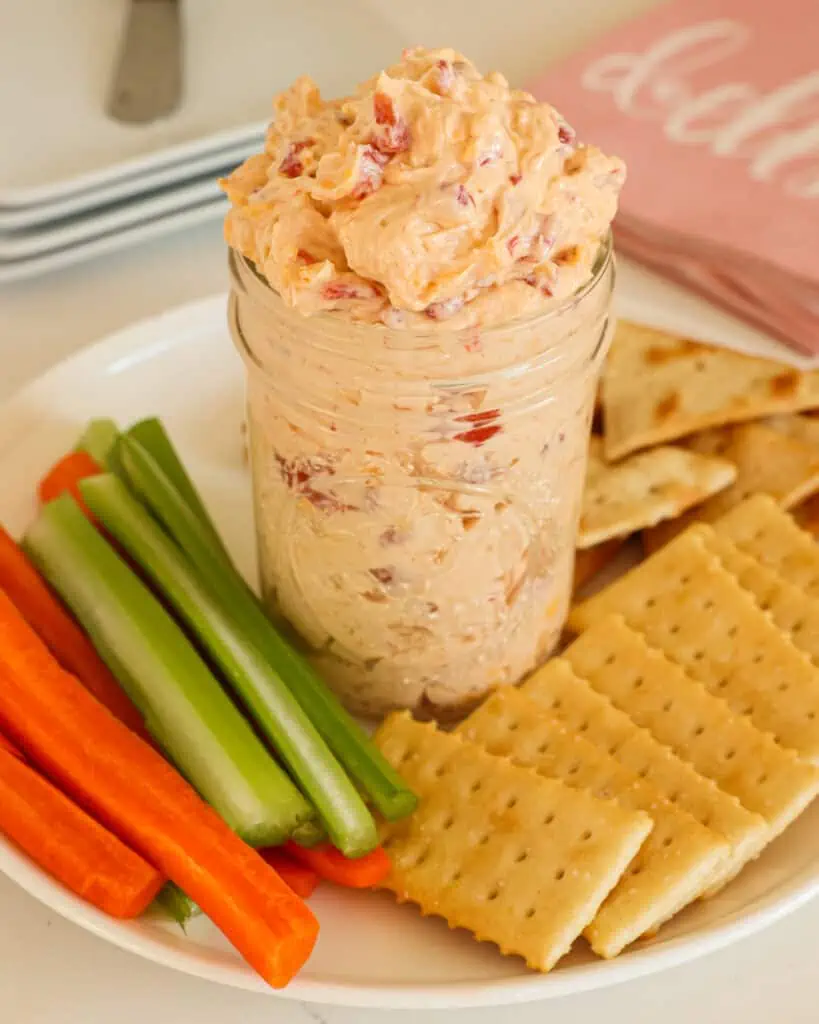 This crazy good cheese dip can be prepared in advance, stored in an airtight container, and stirred before placing it in a serving bowl.