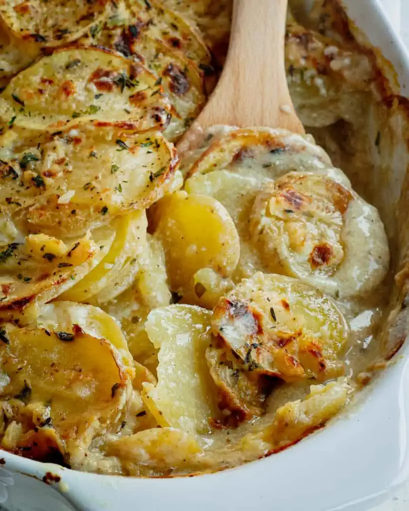Remove the foil and bake uncovered for 30-45 minutes or until the potatoes are tender and the casserole is bubbly on the edges. 