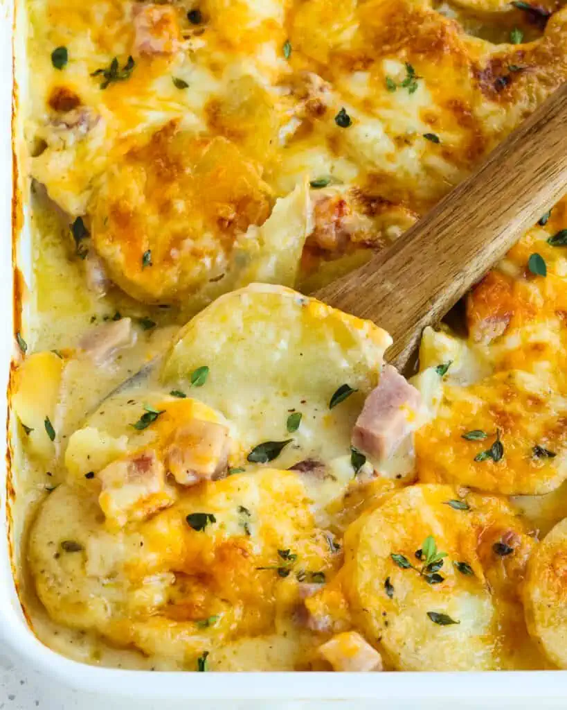 This creamy and delicious scalloped potatoes and ham dish is the best comfort food and perfect for a hearty dinner
