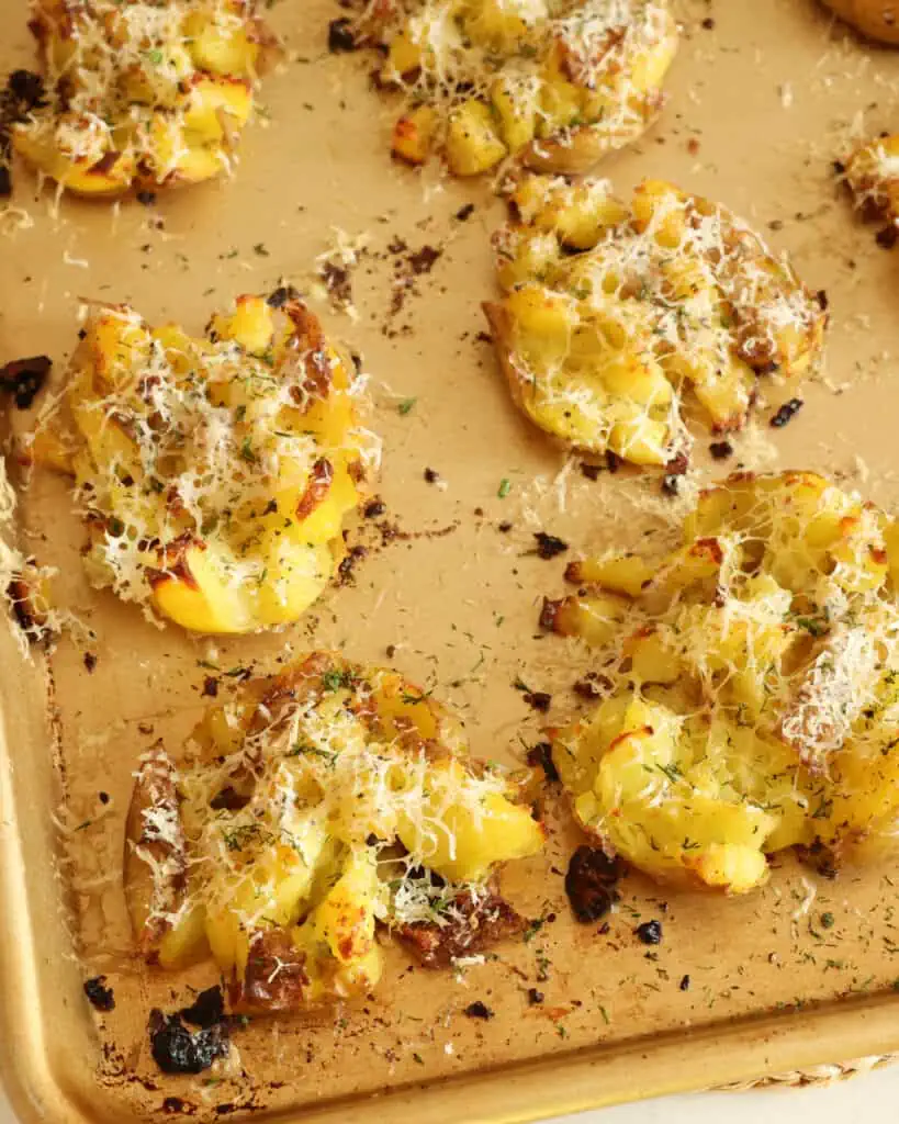 Remove from the oven and sprinkle fresh herbs and Parmesan cheese. Return to the oven for 5-10 minutes. For best results, serve these potatoes promptly. 