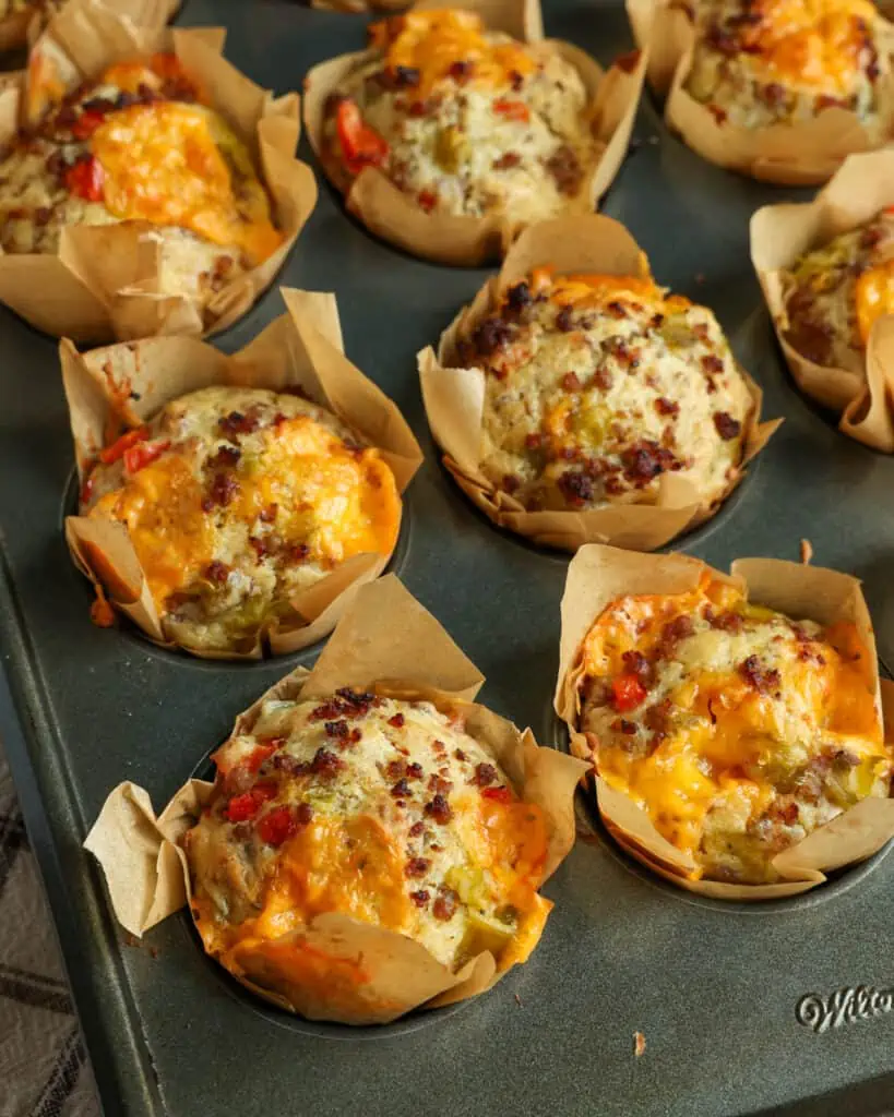 These delectable Breakfast Muffins are loaded with pork sausage, sweet red bell peppers, green chiles, and sharp cheddar. 