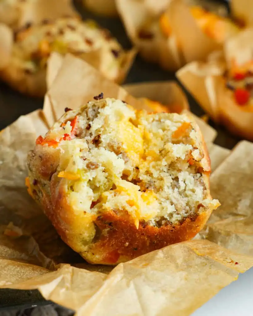 These easy-to-make Breakfast Muffins are freezer-friendly and are plump and full of sausage, peppers, and sharp cheddar cheese. Bake a batch for your family today and listen to all the praises.