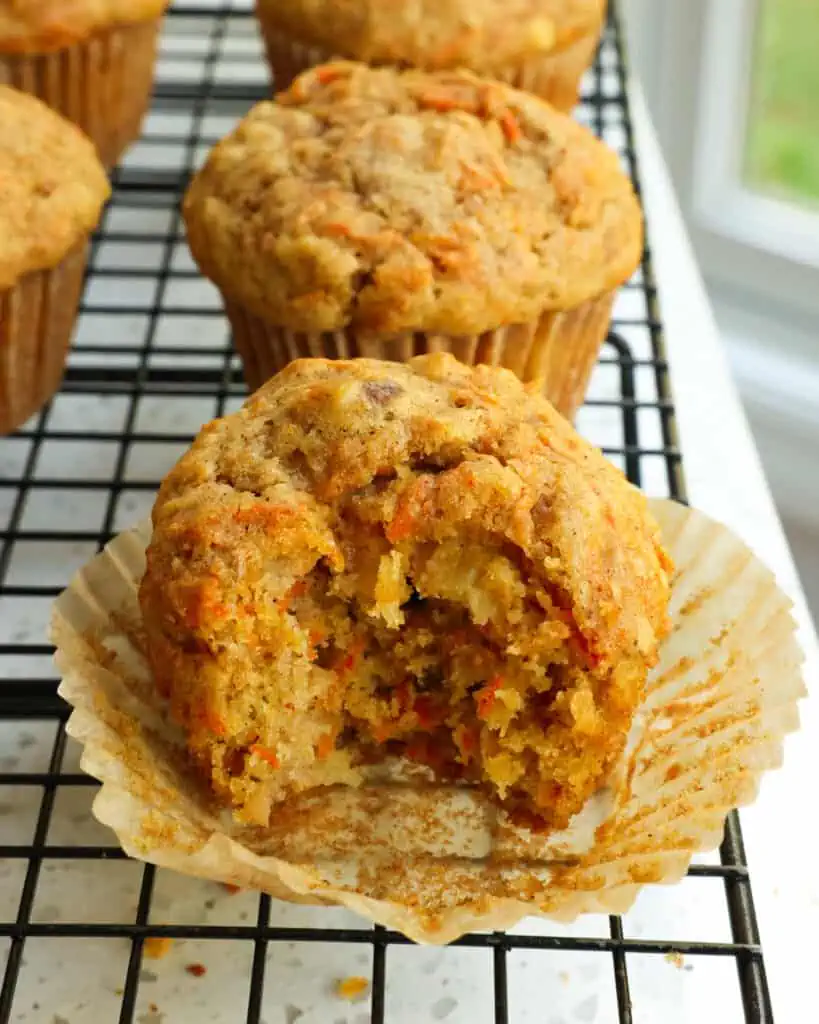 Carrot Cake muffins are tall bakery-style muffins with just the right balance of spice from cinnamon and ginger