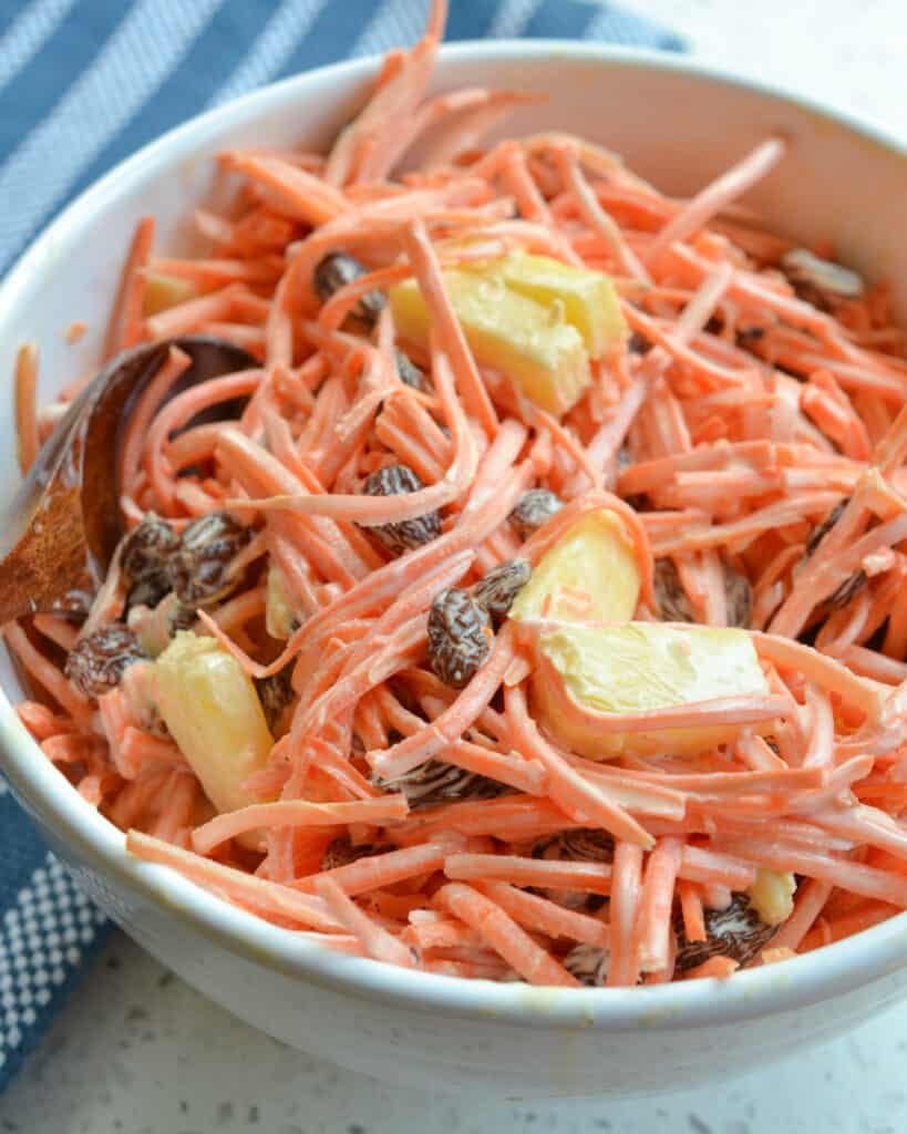 This carrot raisin salad is full of only all natural wholesome ingredients including honey instead of refined sugar. 