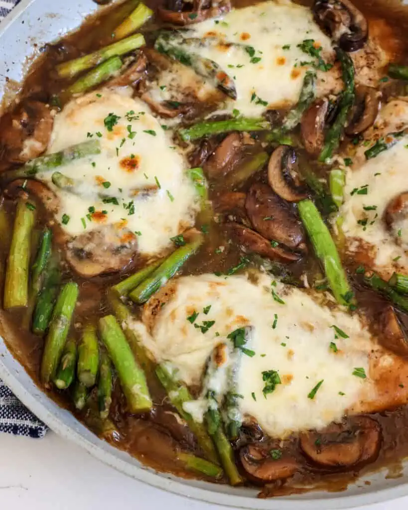 Chicken Madeira combines tender chicken, crisp asparagus, and melty mozzarella cheese in a sweet and savory wine sauce. 
