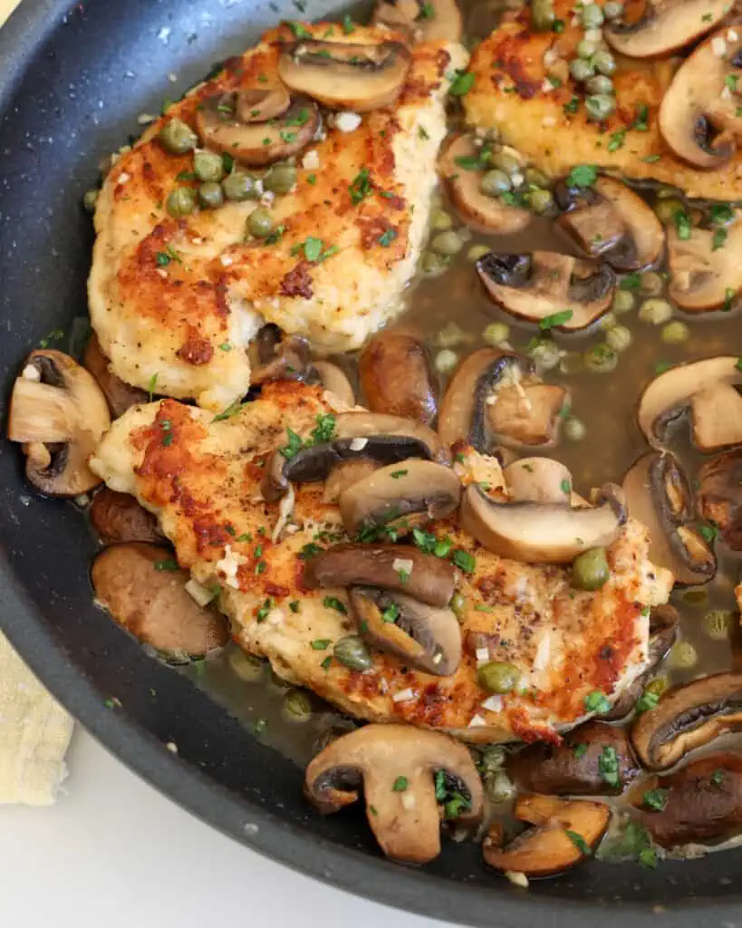 This quick and easy chicken scallopini recipe is sure to become a go-to favorite with its juicy chicken, tangy lemon, and salty capers. 