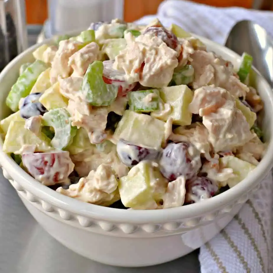This delectable family favorite Chicken Waldorf Salad is tender chunks of chicken mixed with celery, grapes, apples, toasted walnuts, and mayonnaise. it is a tasty blend of flavors and textures.