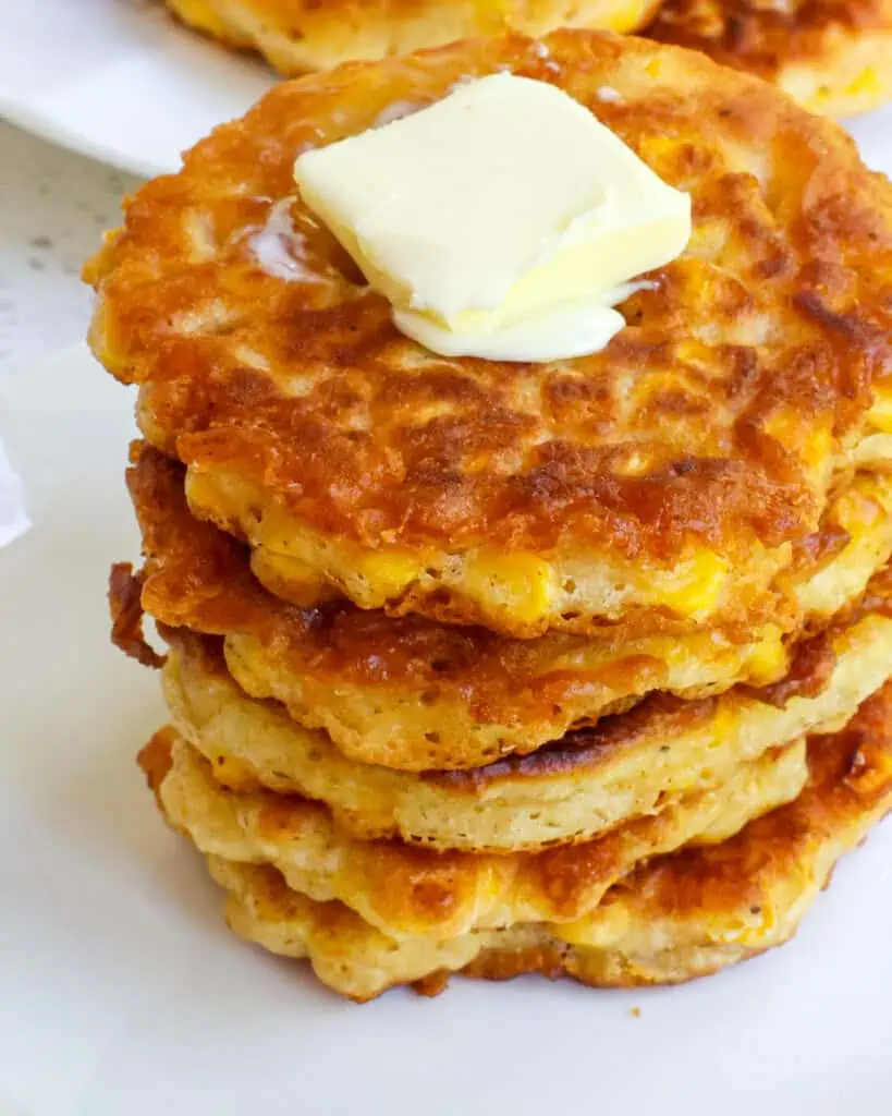 This Corn Fritters Recipe is made with simple pantry staples, mixed up in less than 10 minutes, and pan fried golden and crispy. 