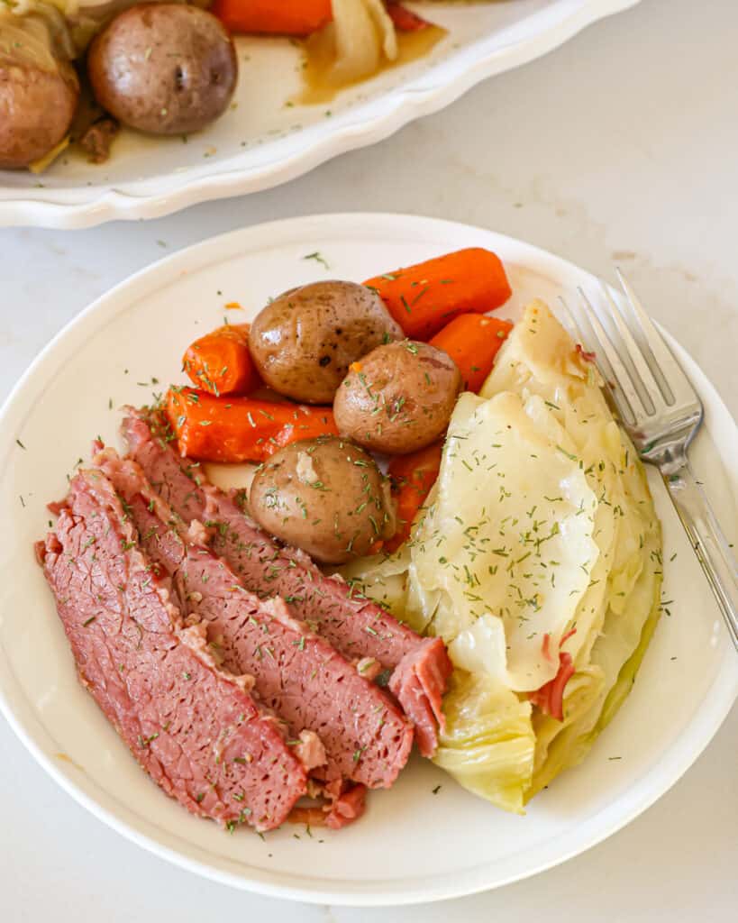 With step-by-step instructions, you'll have the perfect St. Patrick's Day dinner with tender and flavorful corned beef, cabbage, carrots, and baby red potatoes.