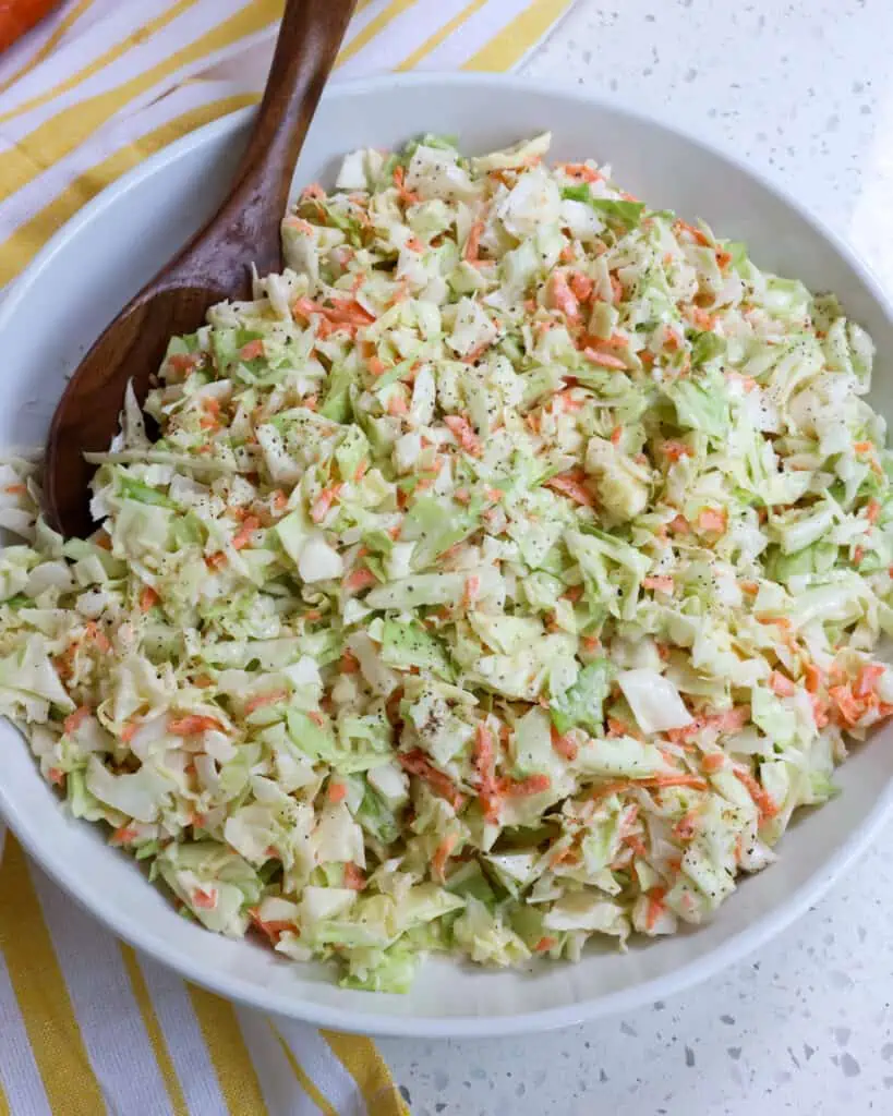 This will quickly become your go-to summer recipe for creamy slaw. It tastes just as good as KFC coleslaw but with added creaminess.