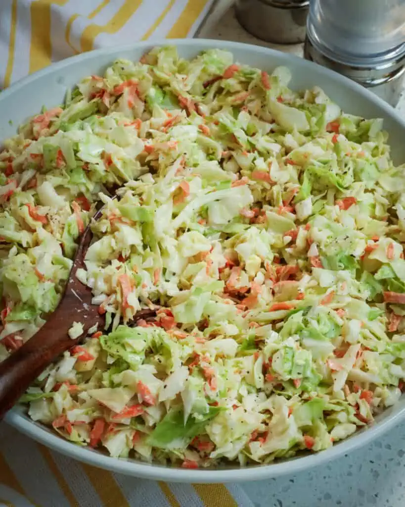 This will quickly become your go-to summer recipe for creamy slaw. It tastes just as good as KFC coleslaw but with added creaminess.