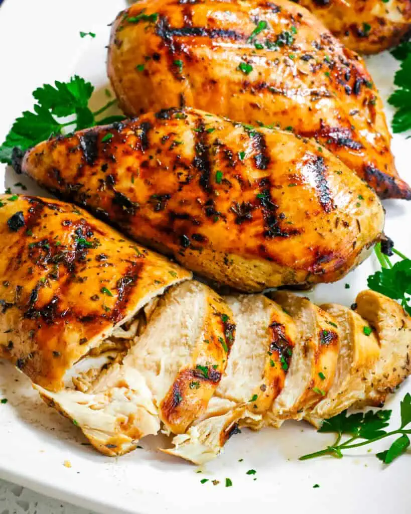 Grilled Chicken is the perfect spring and summer recipe. The Chicken marinates anywhere from 30 minutes to 2 hours and is tender, flavorful, and moist every time. 