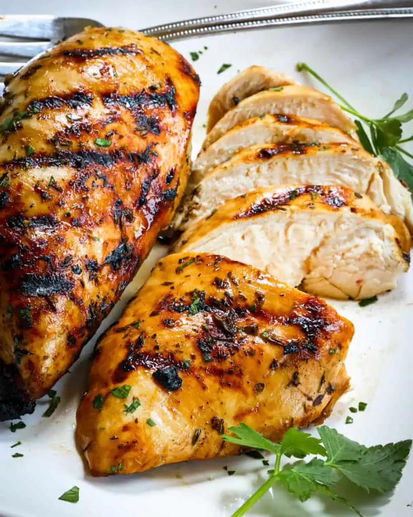 Summer would not be complete without a grilling season, and this is the best Grilled Marinated Chicken Recipe. It is easy, delicious, and dependable. 