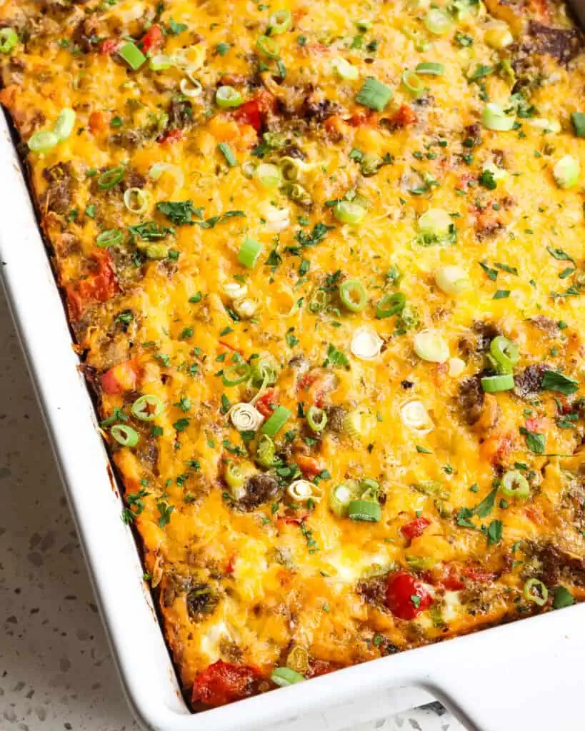 An overhead view of a fresh baked hashbrown casserole dish. 