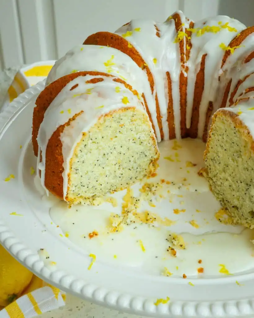 A moist and flavorful Lemon Poppy Seed Bundt Cake made with fresh lemon juice, lemon zest, poppy seeds, and buttermilk and topped with an easy lemon glaze.  Surprise your family and make this tasty treat for your next event.