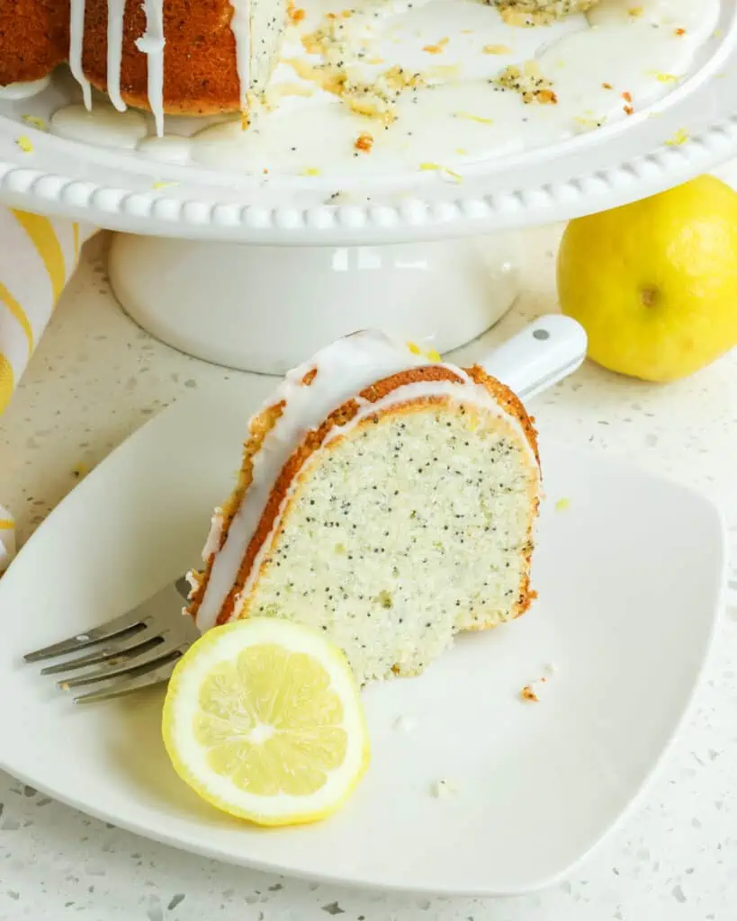 This scrumptious Lemon Poppy Seed Cake is made with buttermilk, fresh lemon juice, lemon zest, and poppy seeds creating a moist and flavorful spring and summer dessert.