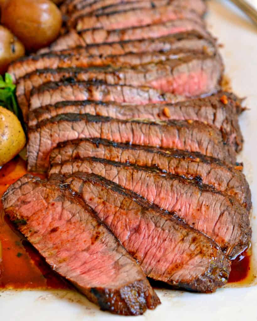 London broil sliced and put on a plate. 
