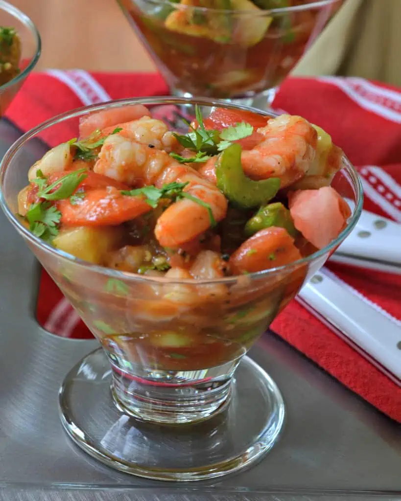 This scrumptious Mexican Shrimp Cocktail is bursting with fresh veggies, steamed shrimp, creamy avocado, tomatoes and jalapenos in a slightly spicy tomato based sauce that is quick to come together.