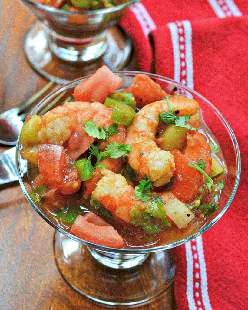 Mexican Shrimp Cocktail is a mouthwatering experience from the sweet cilantro to the taste of the creamy avocado. 