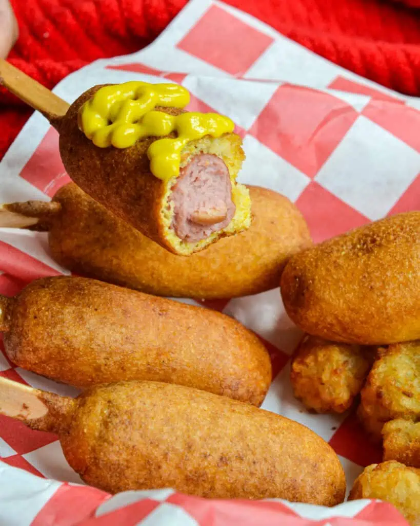 These bite-size fair-worthy homemade Mini Corn Dogs are so incredibly easy to make with just a little more than a handful of ingredients that you may already have on hand. 