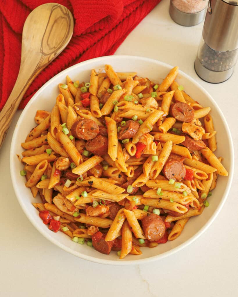A delicious easy Pastalaya Recipe combining linguine, Andouille Sausage, shrimp, bell pepper, and onions in a tomato base that is seasoned to taste with Cajun spices.