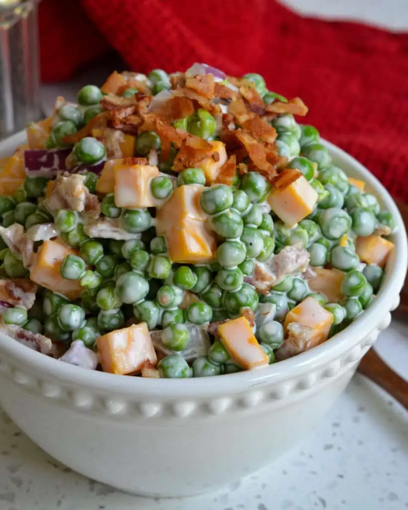 This creamy pea salad comes together in less than ten minutes, and it is a favorite at family reunions, potlucks, barbecues, and picnics.  
