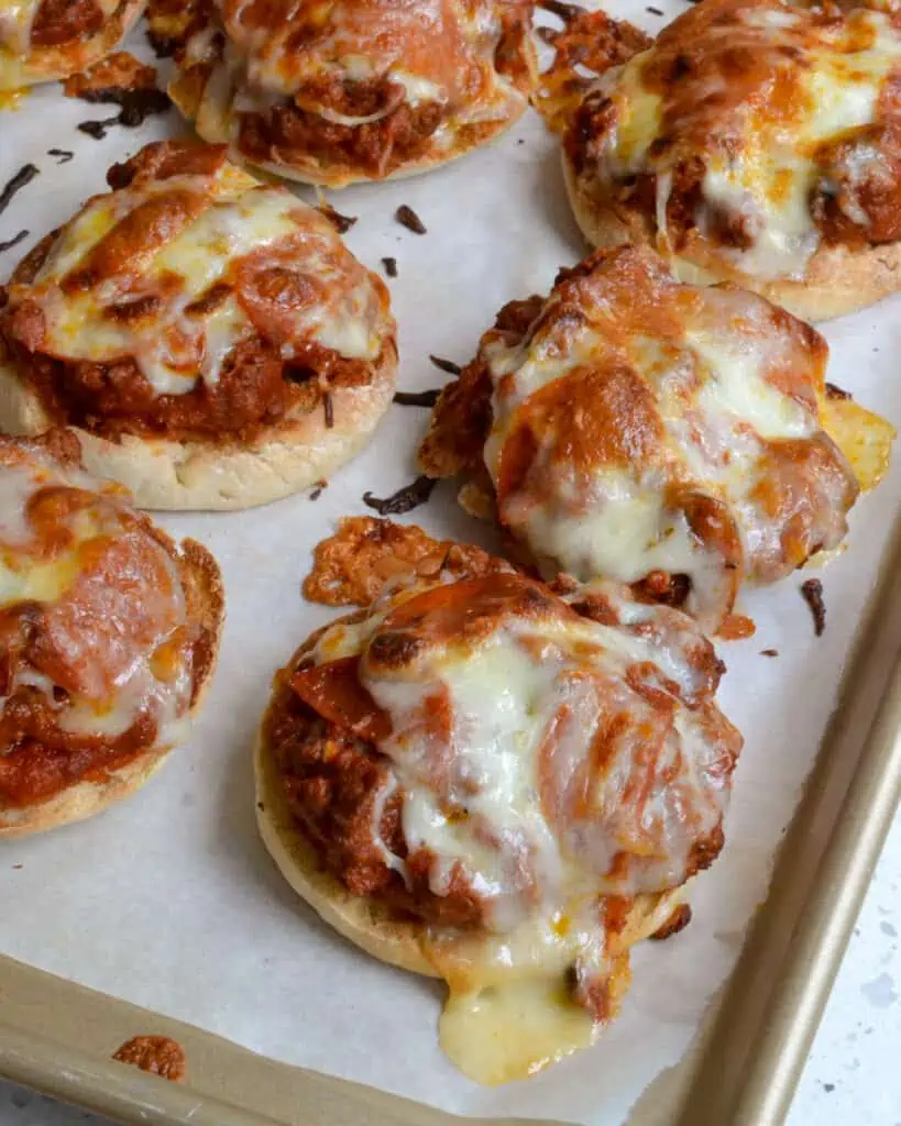 Fun and easy open faced pizza burgers topped with ground beef, onions, mushrooms, pepperoni, and mozzarella. They are perfect for swim parties, movie night, and game day.