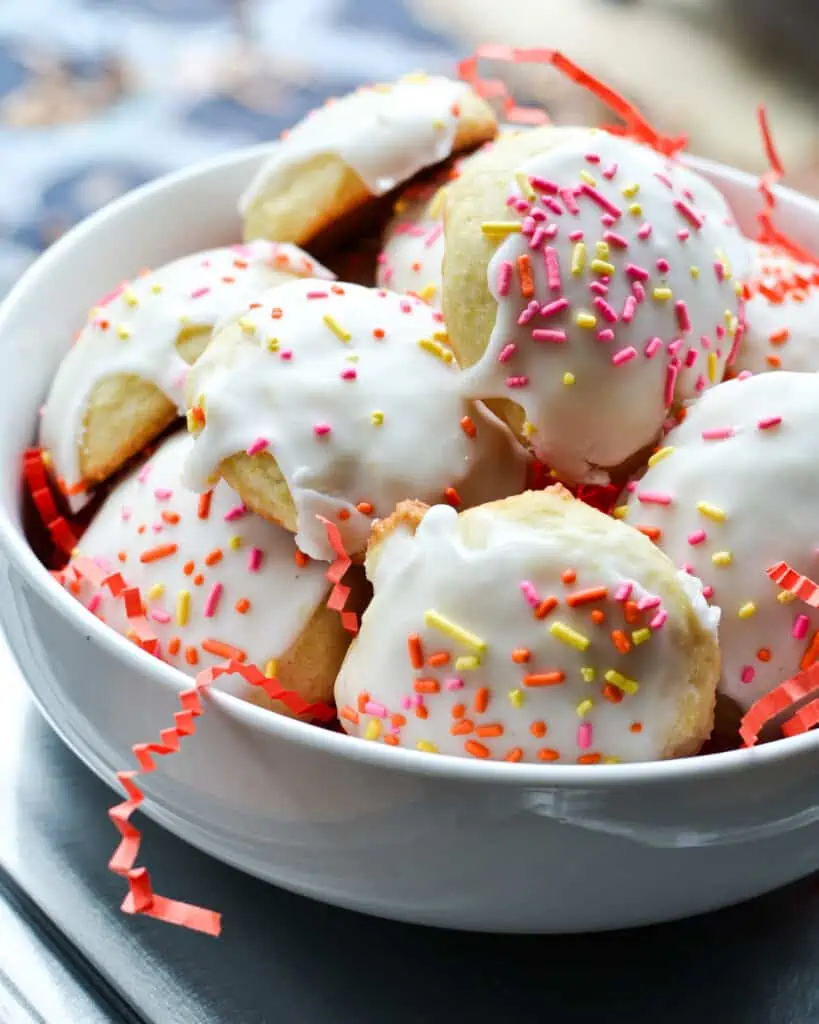 Lemon Ricotta Cookies are soft, cake-like cookies made with ricotta cheese and fresh lemons. Customize with sprinkles or a little lemon zest for a simple yet elegant touch.