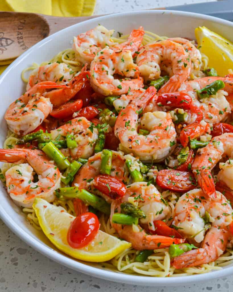 Shrimp Scampi is a classic shrimp dish with a lemon garlic wine butter sauce prepared in about fifteen minutes.