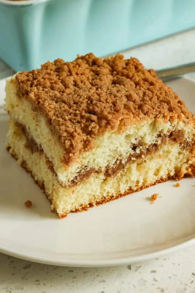 This family-friendly coffee cake combines sour cream and butter for a moist rich decadent cake.  The easy four ngredient streusel filling takes this treat over the top.
