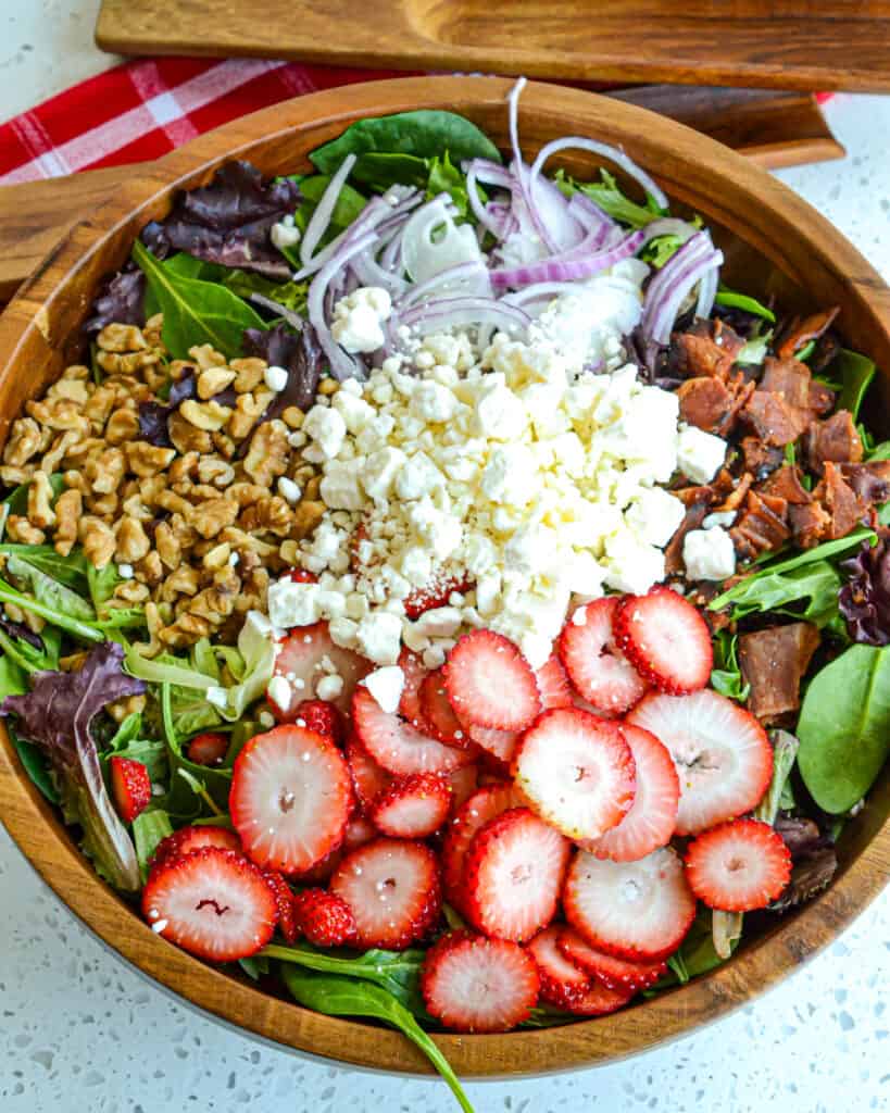 This Strawberry Spinach Salad with homemade poppy seed dressing is always a hit for spring and summer gatherings. 