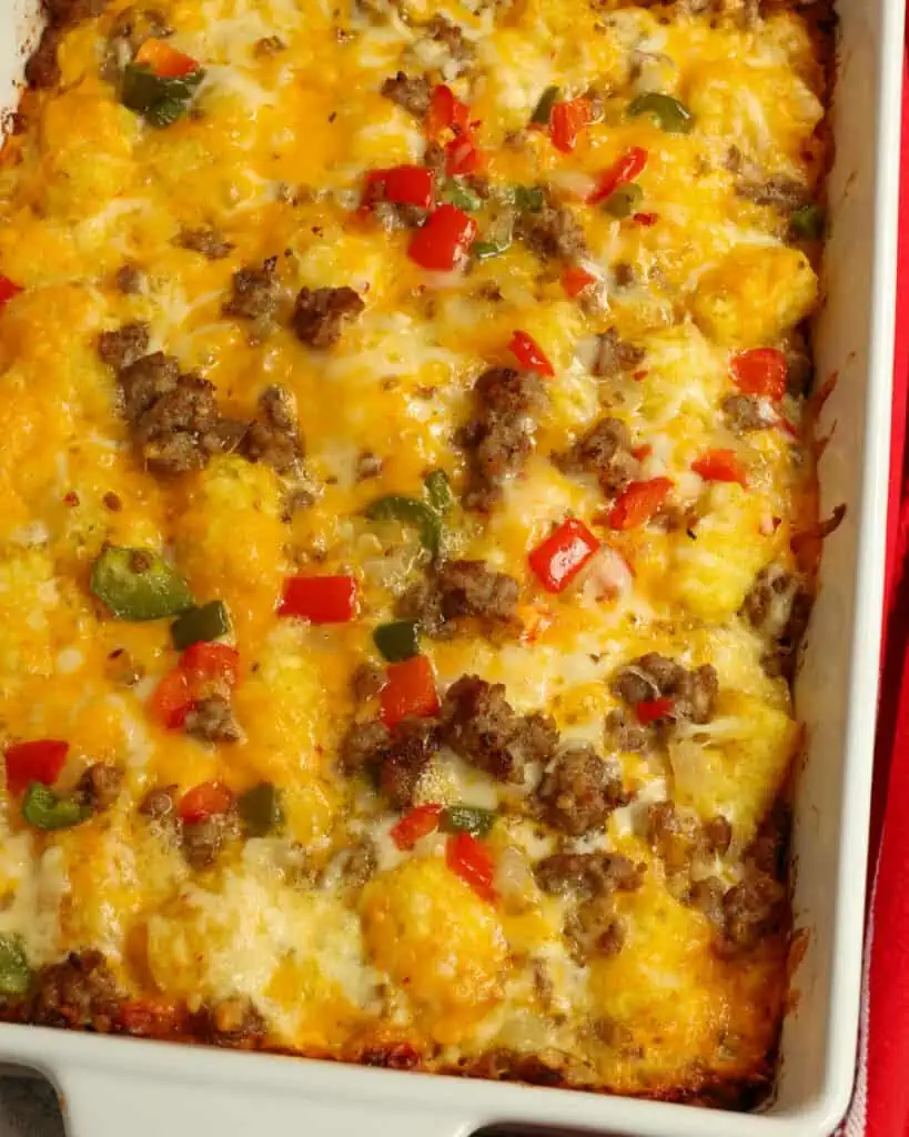 Check out this Tater Tot Breakfast Casserole that is sure to be a crowd-pleaser. With crispy tater tots, savory sausage, and melted cheese,