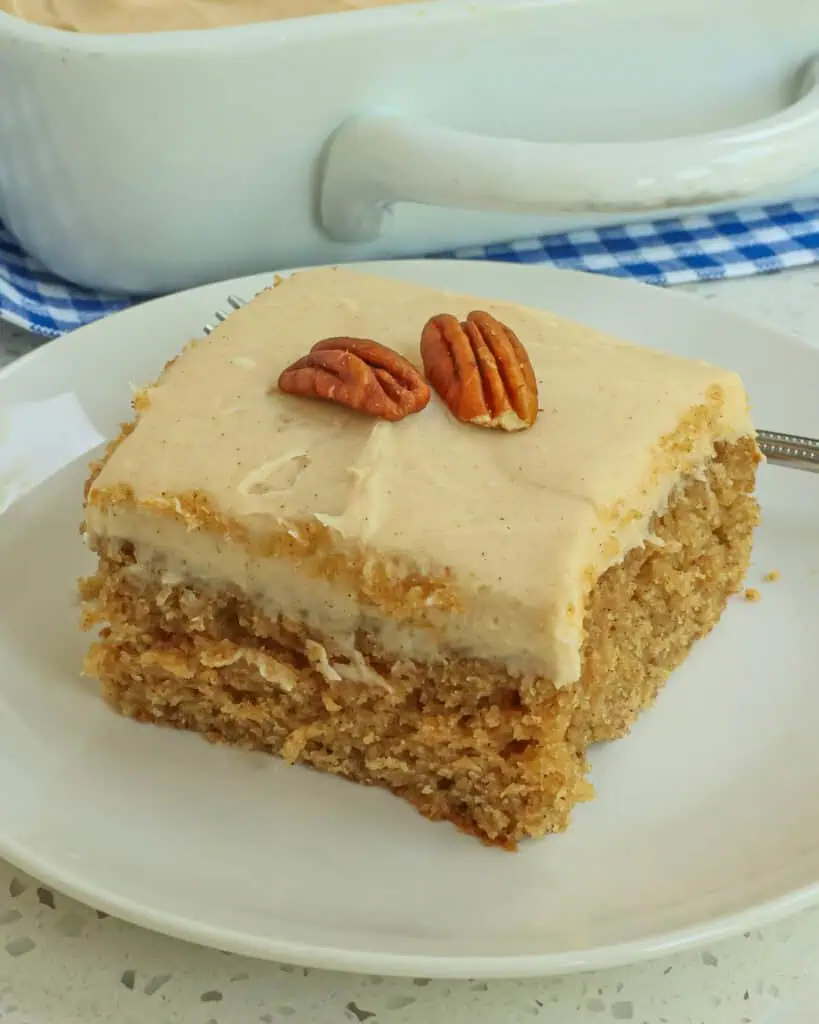 This delicious and moist Applesauce Cake is made with applesauce, ground cinnamon, ginger, nutmeg, and cloves all topped with a delicious five ingredient cinnamon cream cheese frosting.  