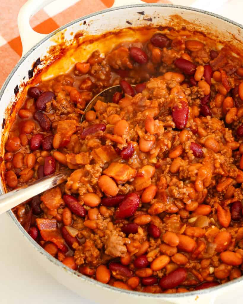 Cowboy bean are packed with ground beef, bacon, onion, garlic, spices, and a hint of sweetness. 