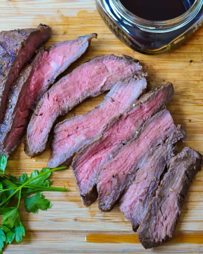 Grilled Flank Steak is a tender beef steak marinated in a balsamic vinegar-based marinade and seared to perfection.