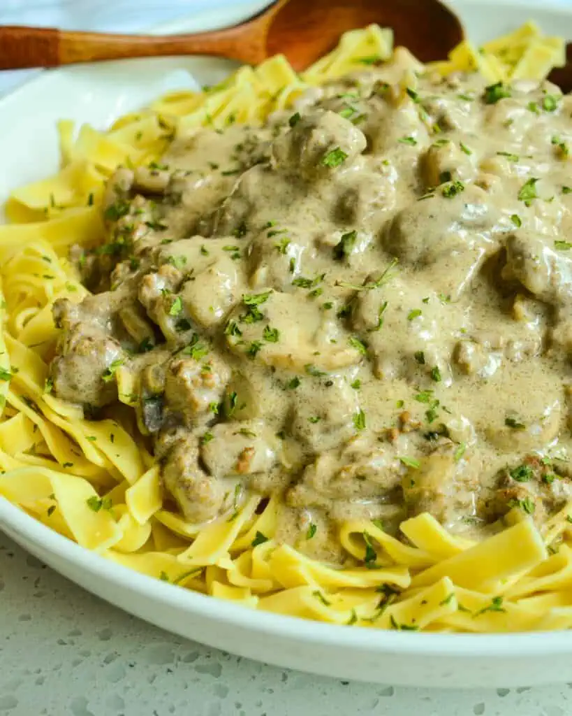 Ground Beef Stroganoff is made with mushrooms, onions, and garlic in a creamy rich gravy.