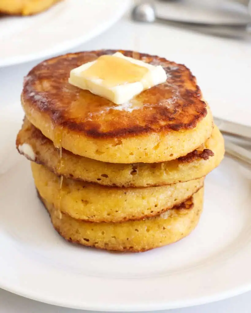 These delectable little fried cornmeal Johnny Cakes are easy, quick and go well with soup, chili and stew.  Or simply enjoy with a little butter and warm syrup.