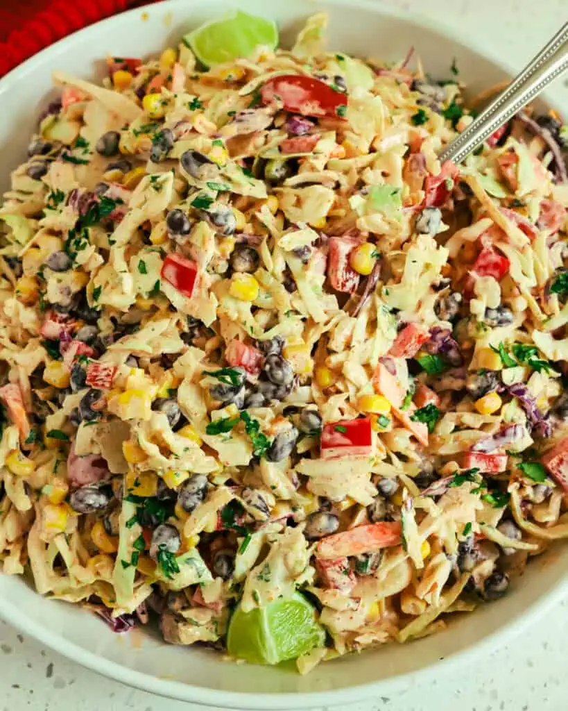 This simple cabbage salad is so quick to come together, and it is the perfect side dish for burgers, chicken tacos, beef steak, and burrito bowls, making it one of my favorite salads.