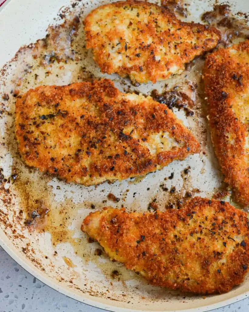 Pan fried chicken breasts with a crisp panko parmesan coating.