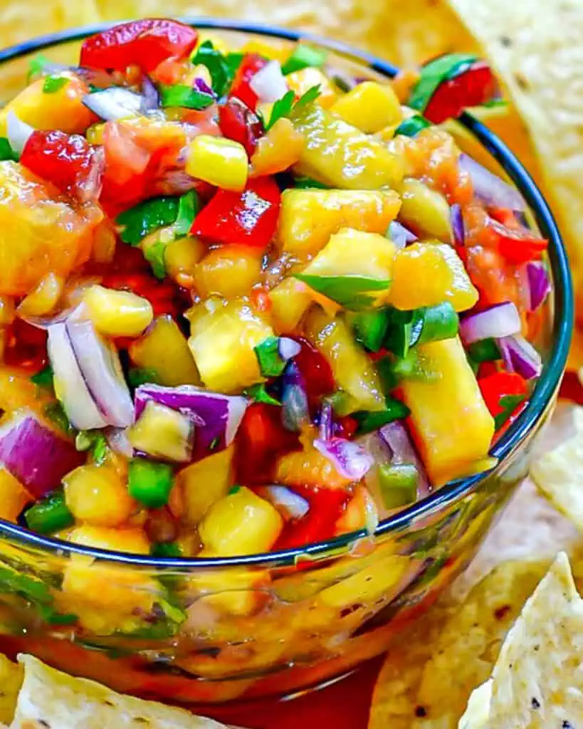 Fresh Peach Salsa takes fresh peaches, sweet tomatoes, and spicy jalapenos to a whole new, tantalizing level of taste.