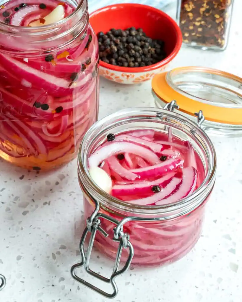 Quick pickled red onions are so easy to make, and they add flavor and texture to so many dishes. Try them on burgers, brats, sandwiches, burritos, tacos, casseroles, and so much more.