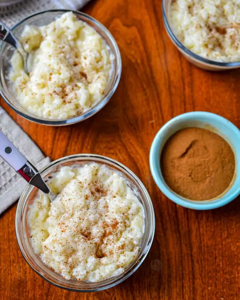 This creamy old fashioned Rice Pudding comes together easily with fresh cooked or leftover rice.  It is so velvety and luscious it will remind you of the pudding your grandmother used to make.