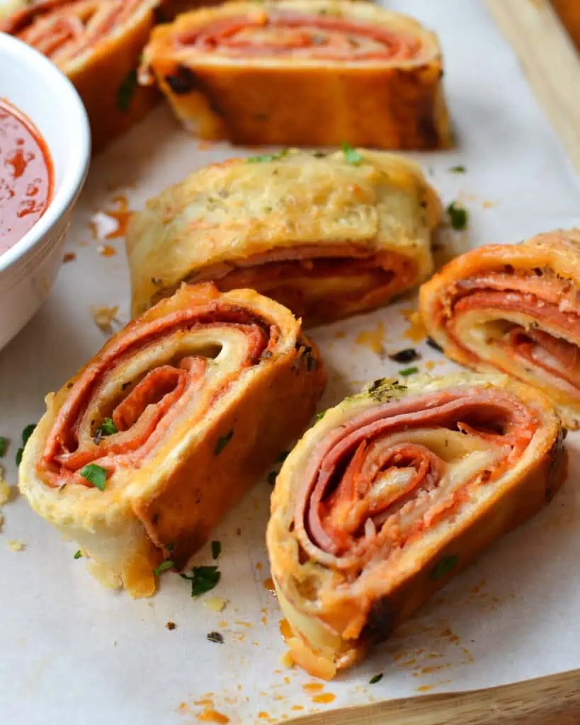 This Stromboli Recipe includes an easy made from scratch pizza dough along with helpful hints on mastering the Stromboli and making this recipe epic.