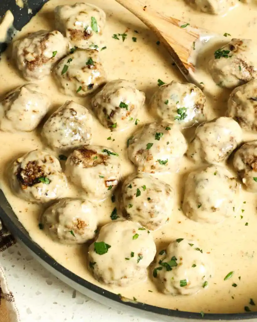 Swedish Meatballs are delicious tender beef meatballs in a hearty rich cream sauce with a hint of allspice and nutmeg