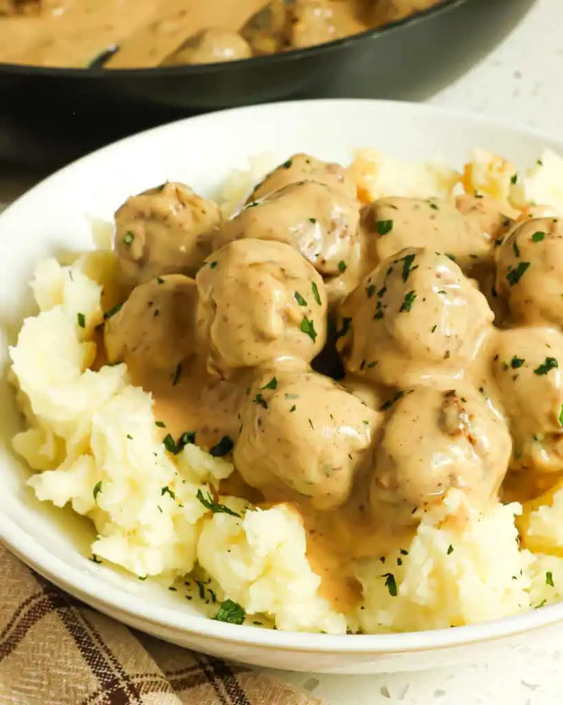 Swedish Meatballs are the ultimate comfort food meal and are absolutely delicious, served over Amish egg noodles or mashed potatoes. 