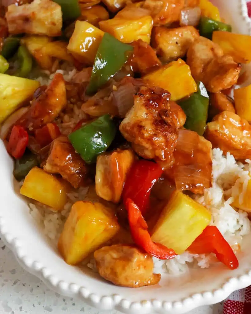 Homemade sweet and sour chicken tastes so much better than Chinese takeout, and it comes together quickly and easily for a tasty family meal. 