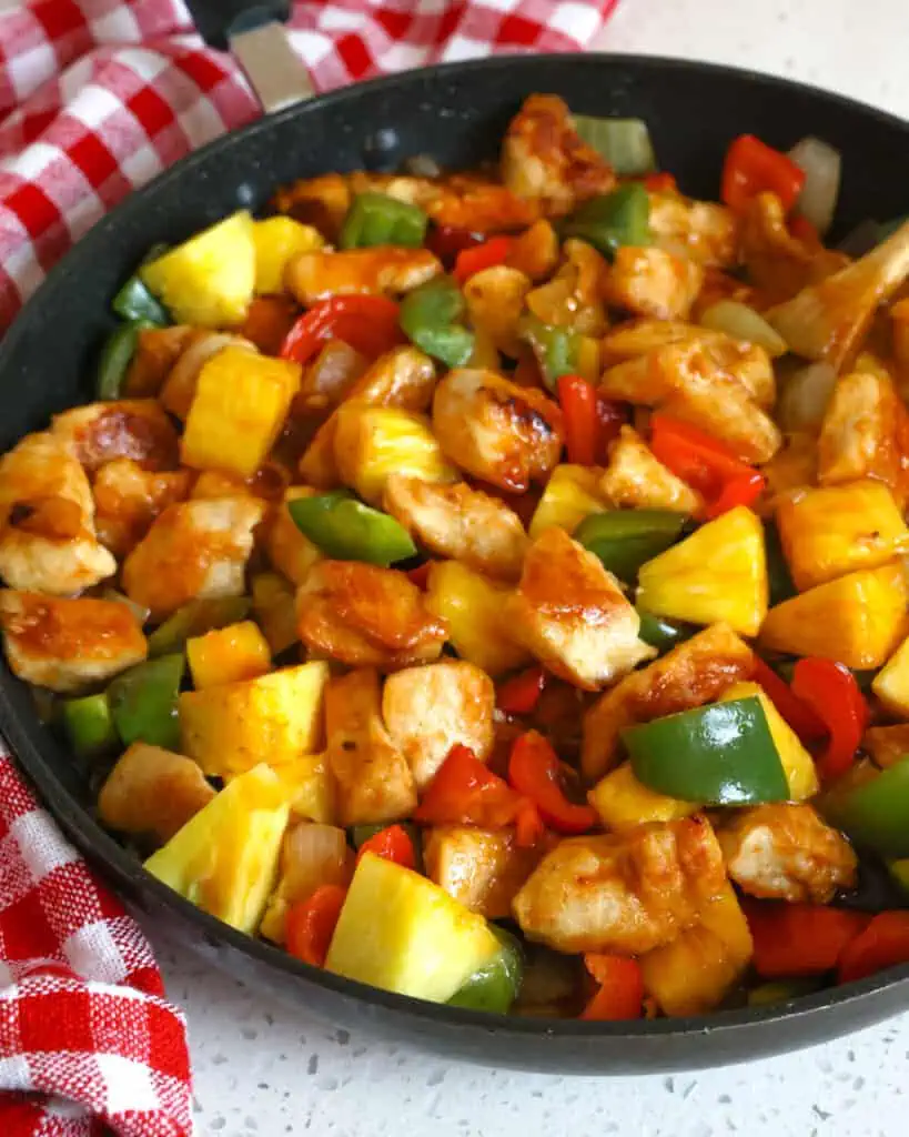 You can pull this Sweet and Sour chicken together in about thirty minutes. It is a tasty dish all by itself, but you can serve it over rice or Chinese noodles.