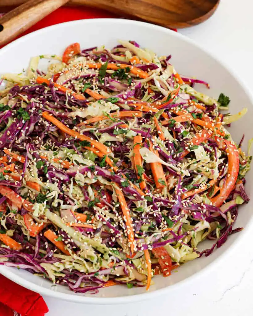 A close up of Asian slaw with sesame seeds.