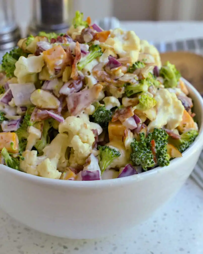 A bowl of Creamy Broccoli Cauliflower Salad