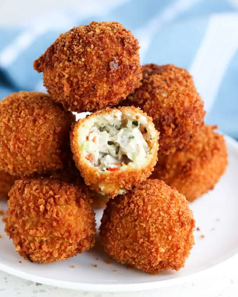 A plate full of fresh fried chicken croquettes